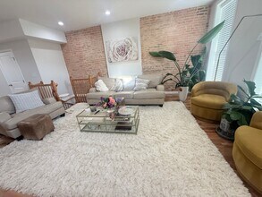 Building Photo - East District 3 BR/3.5 BA End Row Home w-Private Parking