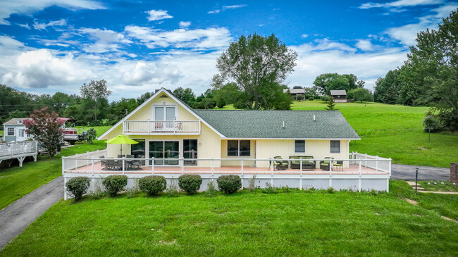 Back of the house with main deck - 21392 Lakeshore Dr