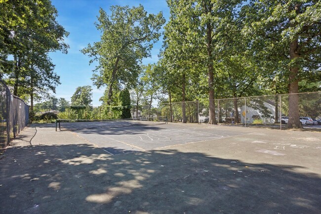 Building Photo - Available Immediately – 4 Bedroom End-Unit...