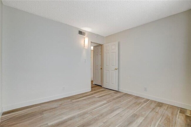 Building Photo - Completely Updated and Move-In Ready, 2 bedroom, 1 bath first floor unit!