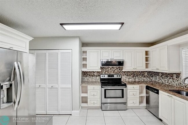 Building Photo - 12215 Royal Palm Blvd