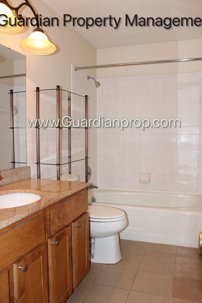 Building Photo - Main Level Apartment Pet Free Apartment, 1 Garage Space & 1 Surface Space, Pet Free Building
