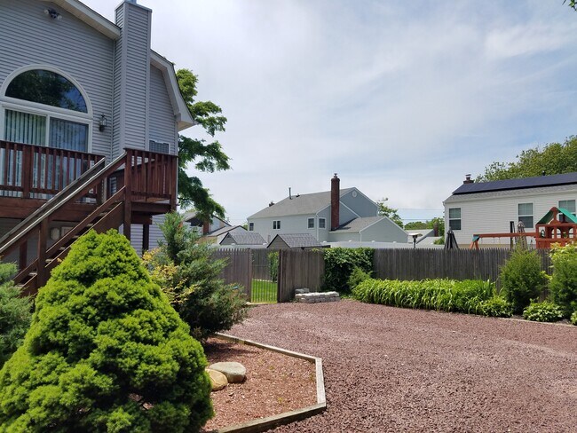 On-property parking area - 270 Connetquot Rd