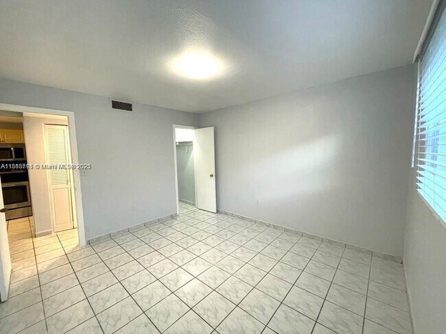 Building Photo - 4275 NW S Tamiami Canal Dr