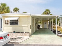 Building Photo - "Charming 2-Bed Furnished Annual Retreat i...