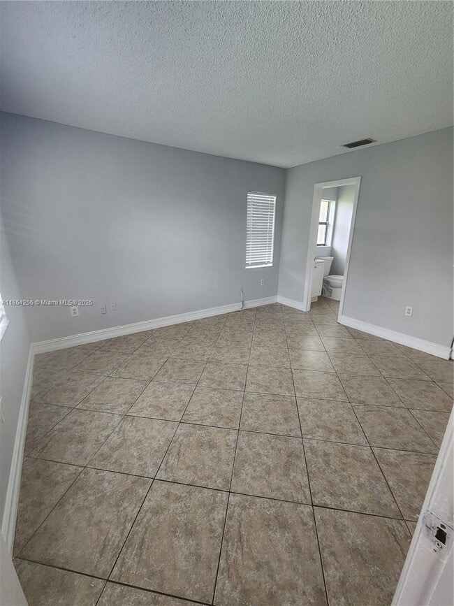 Building Photo - 10960 NW 29th Ct