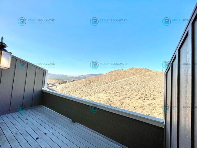 Building Photo - Stunning 3-Bedroom Townhome with Panoramic City Views, Upgraded Kitchen & Spacious Living in Nort...