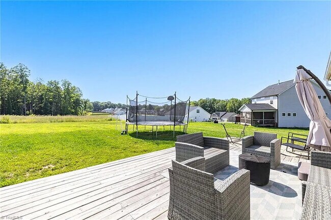 Building Photo - Earn Wealth While Leasing - Like a Homeown...