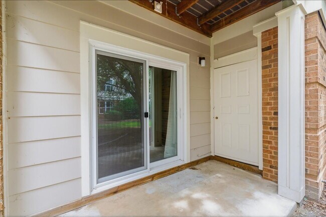 Building Photo - Commuter’s Paradise! Ground-Level 2BR Condo  Welcome home to this stunning, sun-filled 2-bedroom ...