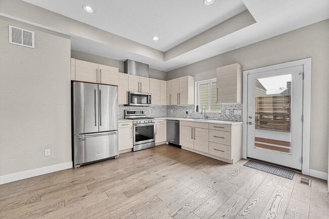 Building Photo - $3,145.95- 3 Bed, 3.5 Bath Townhome in Denver with Central AC and In Unit Laundry