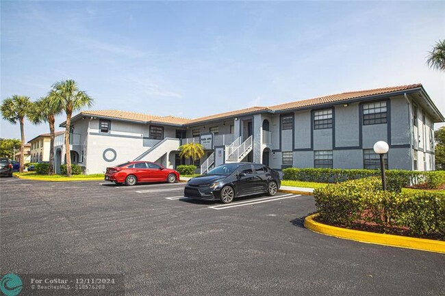 Building Photo - 10687 Royal Palm Blvd