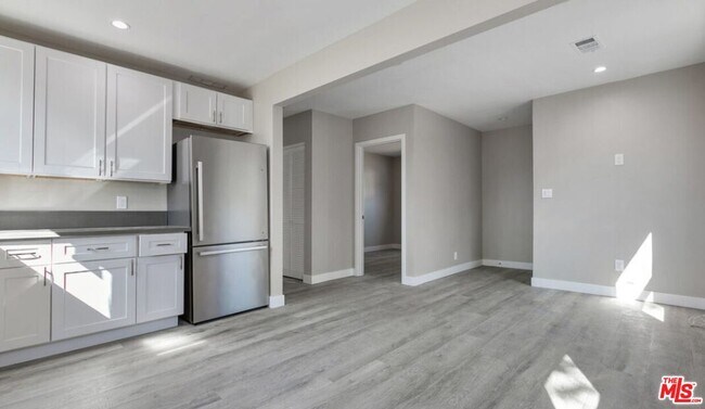 Building Photo - 9217 Langdon Ave