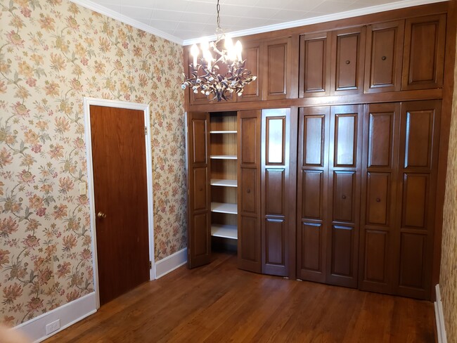 bedroom with oak closet - 6214 61st St