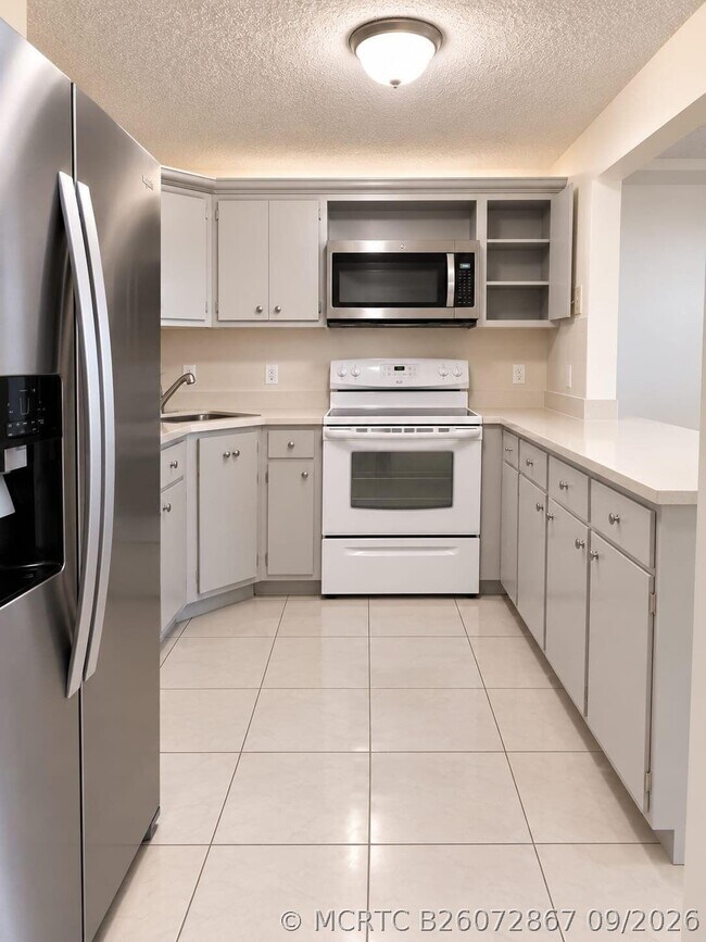 Building Photo - 5991 Whispering Pine Way