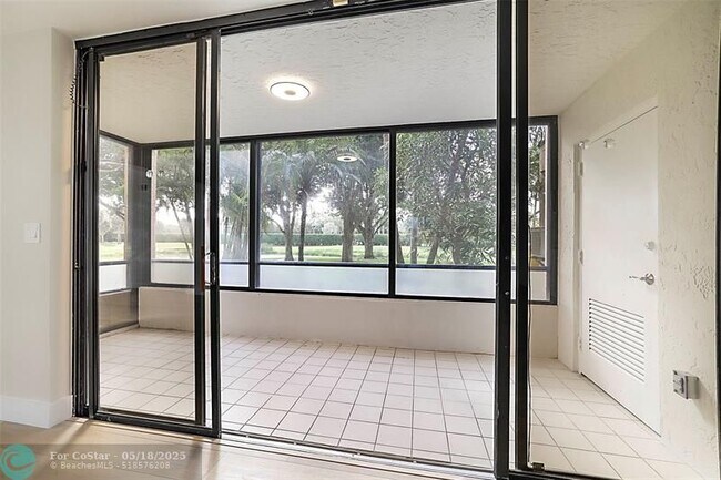Building Photo - 7186 Promenade Dr
