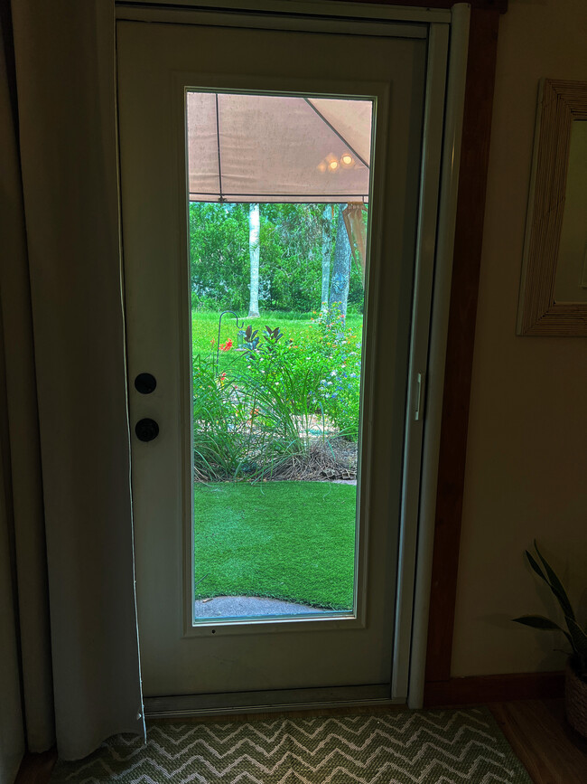 Patio view of pollinator garden - 11024 161st St N