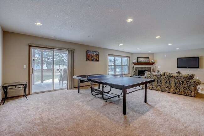Building Photo - Grand 5 bed 4.5 bath Maple Grove Home w/ 3-Car Garage! Fully Furnished