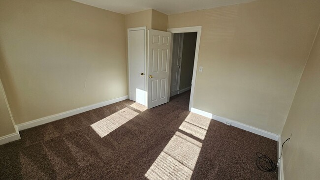 Building Photo - JUST REDUCED!  Ask About Move In Incentives!  3 Bedroom Duplex in Quiet Location