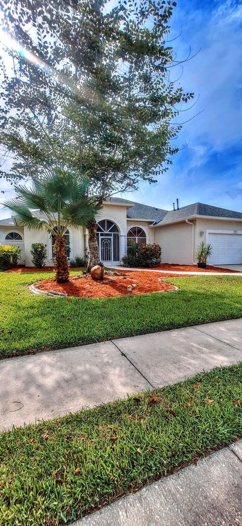 Building Photo - ENJOY LIFE IN THIS 4 BEDROOM UNIQUE LAKE V...