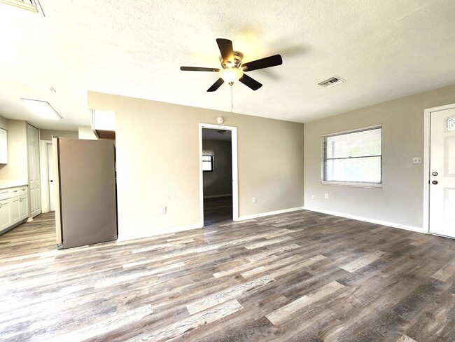 Building Photo - Fully Remodeled Home; New Flooring and Pai...