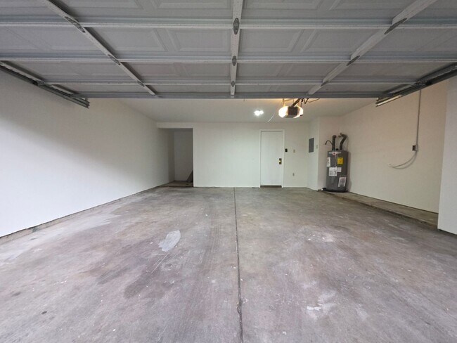 Building Photo - Large 2 bedroom 1.5 bath 2 car garage townhouse new custom flooring and paint throughout with new...