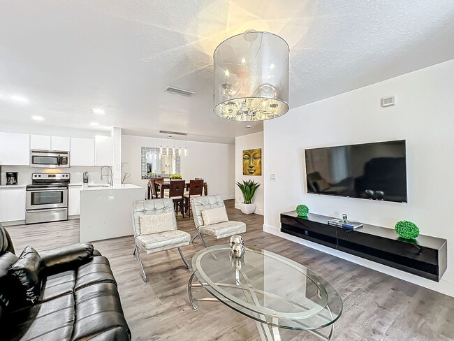 Building Photo - Seurat Street, Orlando, FL 32819 - 4 BR 2 BA condo