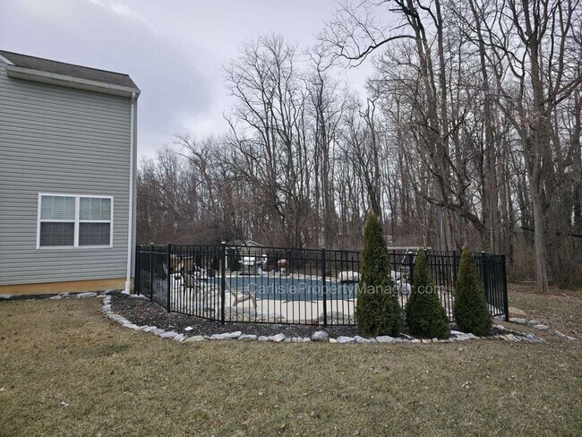 Building Photo - Modern Carlisle Rental with heated inground pool, fireplace, open floor plan, and finished basement