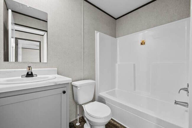 Building Photo - 6550 Hidden Oaks Dr