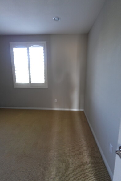 First bedroom off from the kitchen - 8894 Spectrum Center Blvd