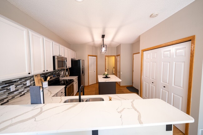 Building Photo - 9679 Alvarado Ln N