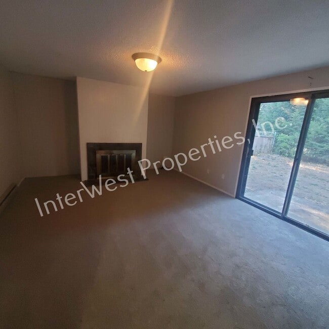 Building Photo - Beautiful Ranch Style Home on Very Large Corner Lot With W/D Hookups, Fireplace, 2 Car Garage & A...