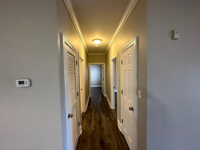 Building Photo - COMING SOON - FIRST FLOOR APARTMENT COMMUN...