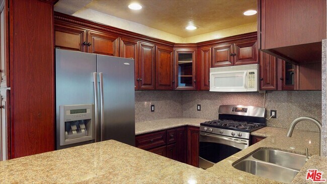 Building Photo - 8600 Tuscany Ave