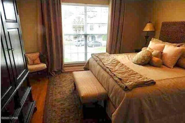 Building Photo - WATERFRONT W/BOAT SLIP!!!! This beautiful home is located in a gated community on North Lagoon Dr...