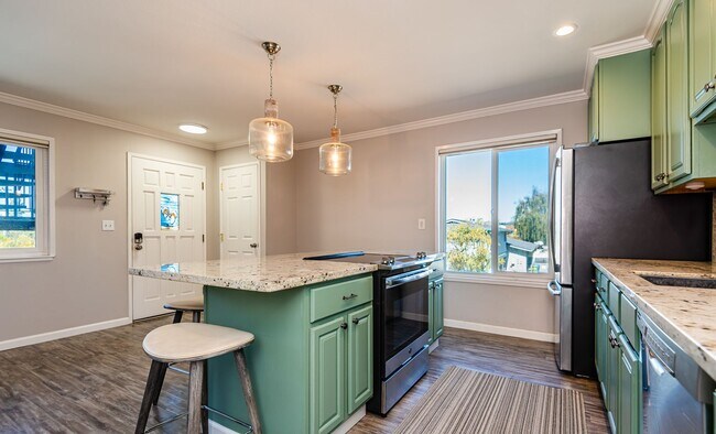 Building Photo - 1 MONTH FREE! Coastal Living at Anchor West | Ocean View Condo Just Minutes from Capitola Village