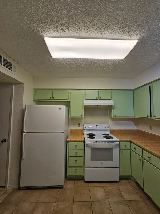 Building Photo - Beautifully Updated 2BR/2BA with Loft Oasis – Safe & Gated Community