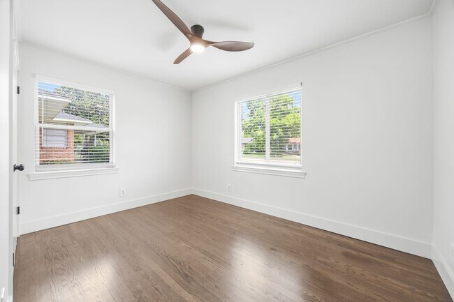 Building Photo - **$40K+ IN UPGRADES AND A FENCED BACKYARD WITH TWO STORAGE BUILDINGS**