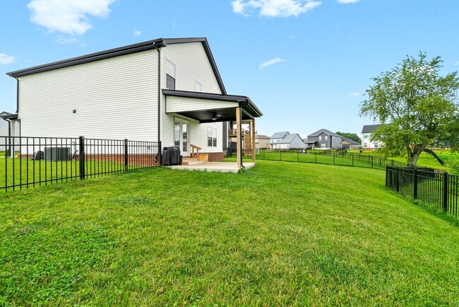 Building Photo - Stocked Pond, Walking Trails and More!!