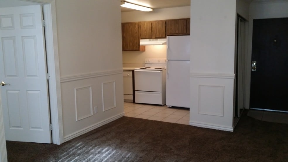 Living Room w/ view of Kitchen - Crestwood Cove