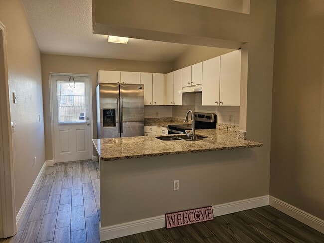 Building Photo - Charming 2-Bedroom, 2-Bath Condo with Priv...
