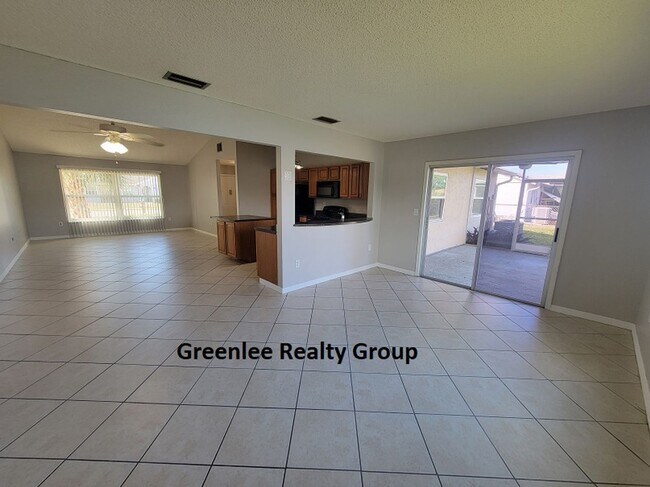 Building Photo - Relax by the water in this spacious 2-bedroom home with a 2-car garage, nestled in the highly des...