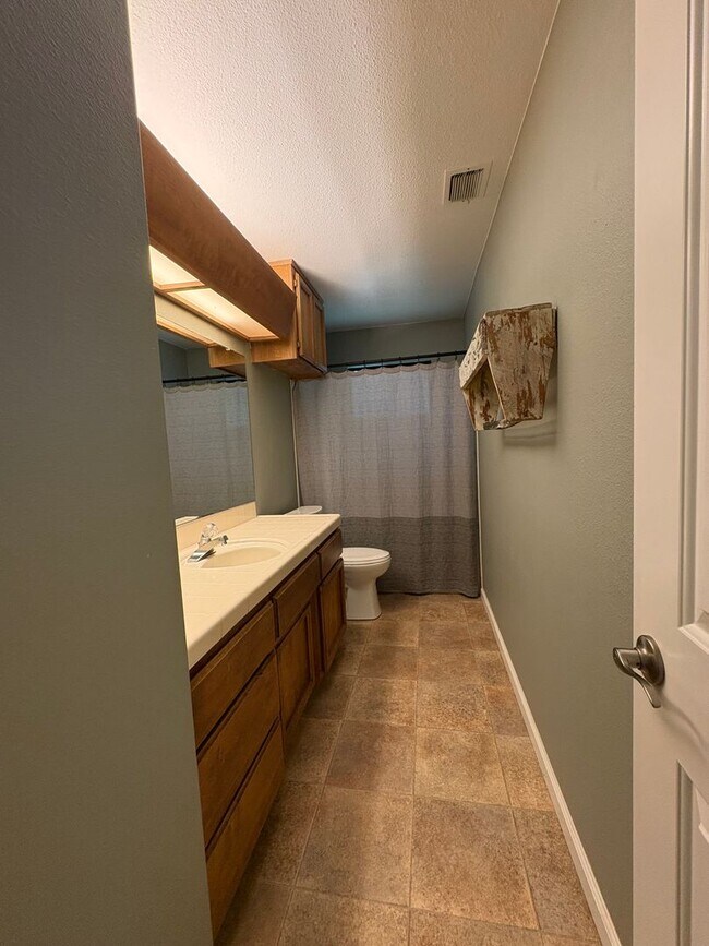 Building Photo - Your Private Escape – Charming Ranch-Style Home with Room to Breathe!