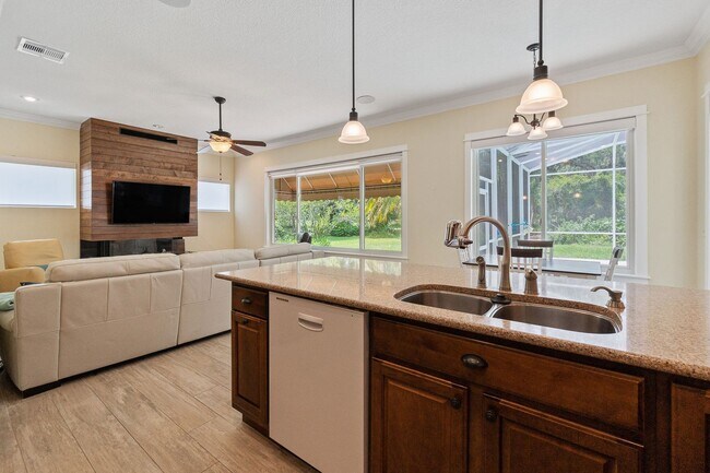 Building Photo - Beautiful 3/3 Pool Home in Gated Community W/ Lake Access