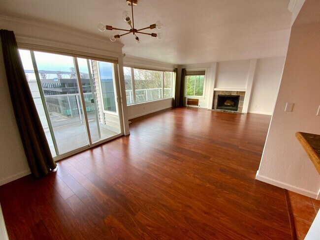 Building Photo - 1,300+ Sq Ft 2BR Condo w/ Parking, W/D & Utilities Included | $1,000 Move-In Credit