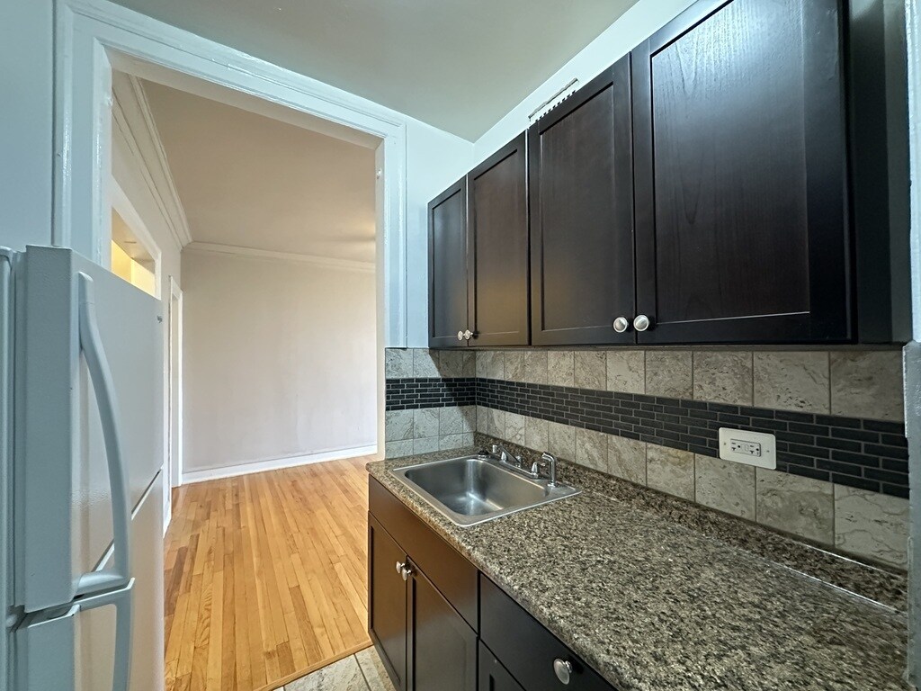 Building Photo - 1371 W Estes Ave