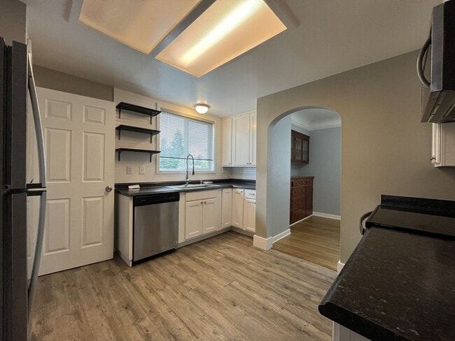 Building Photo - Three-Bedroom Home with Updated Kitchen & Vaulted Ceilings