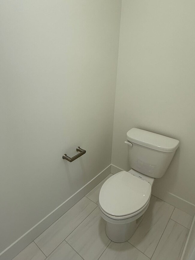 Building Photo - Half off first months rent - Beautiful townhome with 2 car garage, Central Air and Master Suite