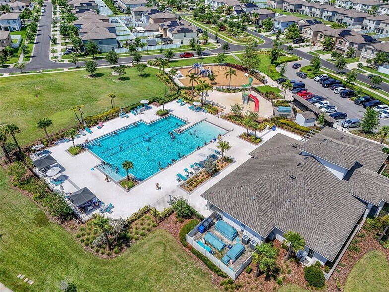 community pool aerial view - 4918 Wild Senna Blvd