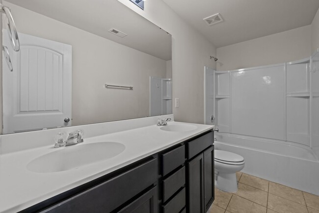 Building Photo - Spacious 5 Bedroom Home with 2-Car Garage,...