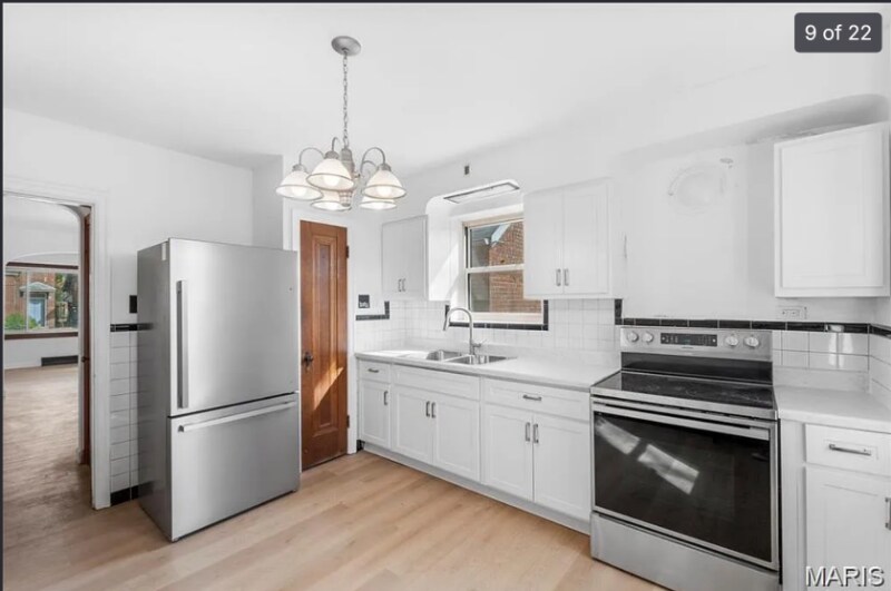 Building Photo - 5034 Queens Ave